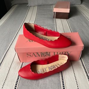 Women’s red flat ballet shoes (size 7.5)